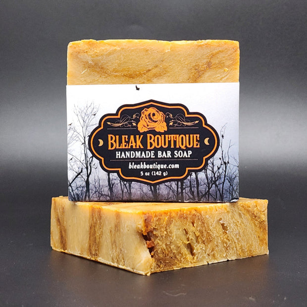 Handmade bar soap with a label on a dark background