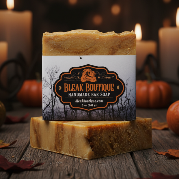 Handmade bar soap from Bleak Boutique with pumpkins and candles in the background