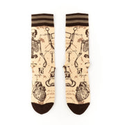 Socks with skeleton and heart design on a beige background