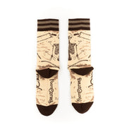Pair of socks with vintage-style design and brand logo on a white background