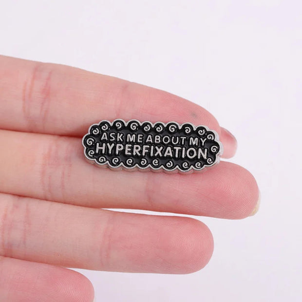 Ask Me About My Hyperfixation" Enamel Lapel Pin - Neurodivergent Humor, Neurospicy Meme Fashion Accessory - Quirky Metal Pin Brooch - AuDHD, ADHD, ADD, Autism Awareness