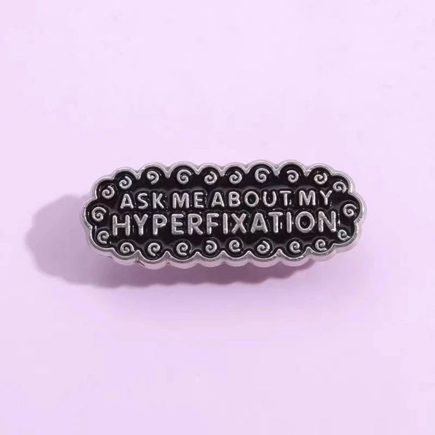 Ask Me About My Hyperfixation" Enamel Lapel Pin - Neurodivergent Humor, Neurospicy Meme Fashion Accessory - Quirky Metal Pin Brooch - AuDHD, ADHD, ADD, Autism Awareness