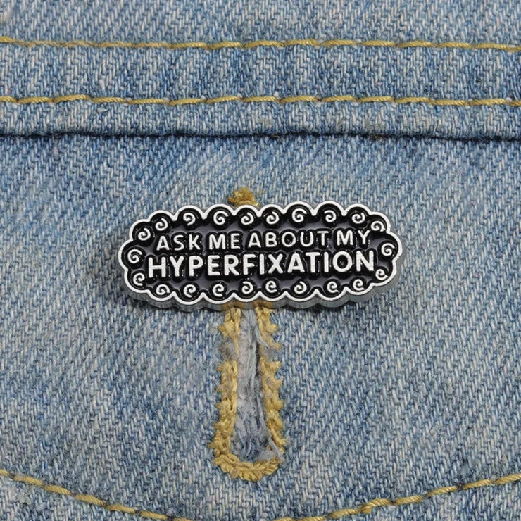 Ask Me About My Hyperfixation" Enamel Lapel Pin - Neurodivergent Humor, Neurospicy Meme Fashion Accessory - Quirky Metal Pin Brooch - AuDHD, ADHD, ADD, Autism Awareness