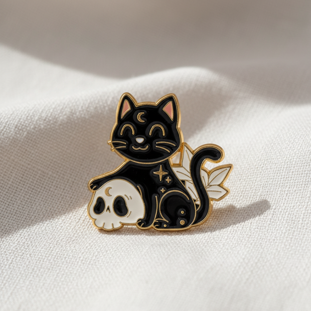 Black cat with moon and star design on a white background