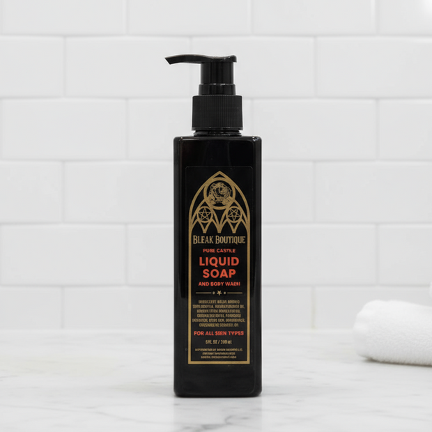 Black bottle of Bleak Boutique liquid soap on a white background