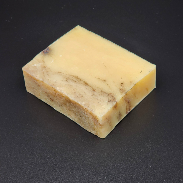 Rectangular bar of soap on a black background