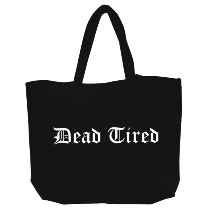 Black tote bag with 'Dead Tired' text on a white background