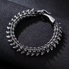 Dragon Spine Articulated Metal Vertebrae Bracelet on a dark background