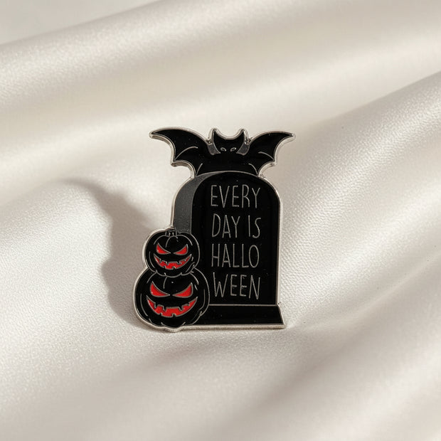 Metallic badge with text and design on a beige background