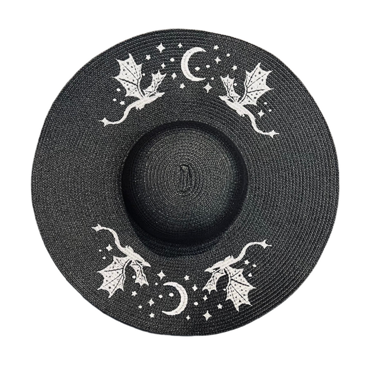 Black straw hat with white dragon and moon designs on a white background