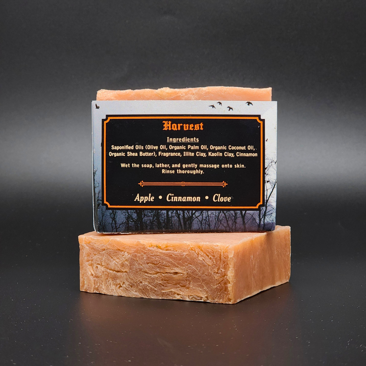 Bar of soap with a label on a dark background