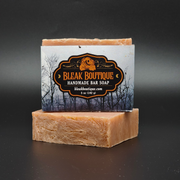 Handmade bar soap from Bleak Boutique on a dark background