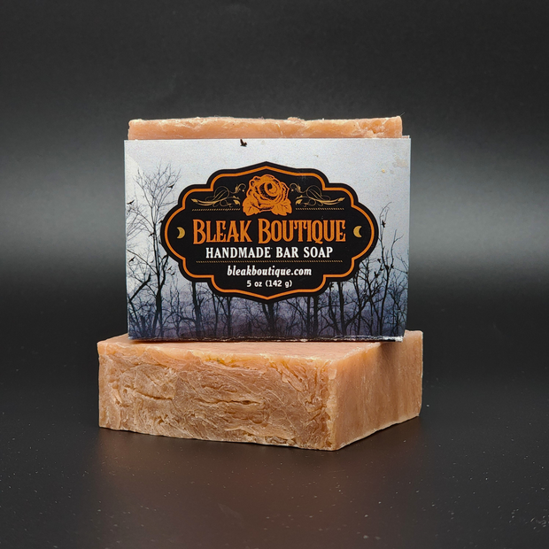 Handmade bar soap from Bleak Boutique on a dark background