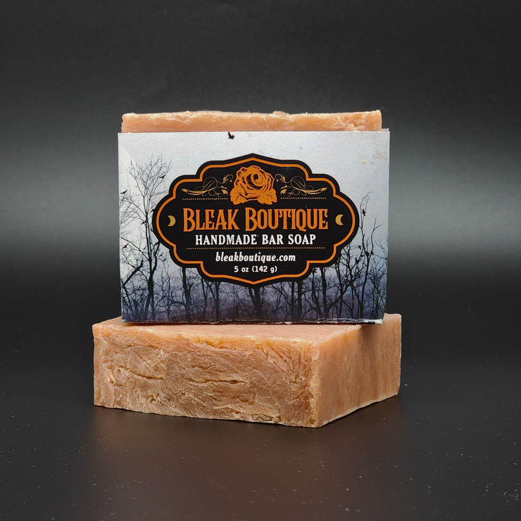 Handmade bar soap from Bleak Boutique on a dark background