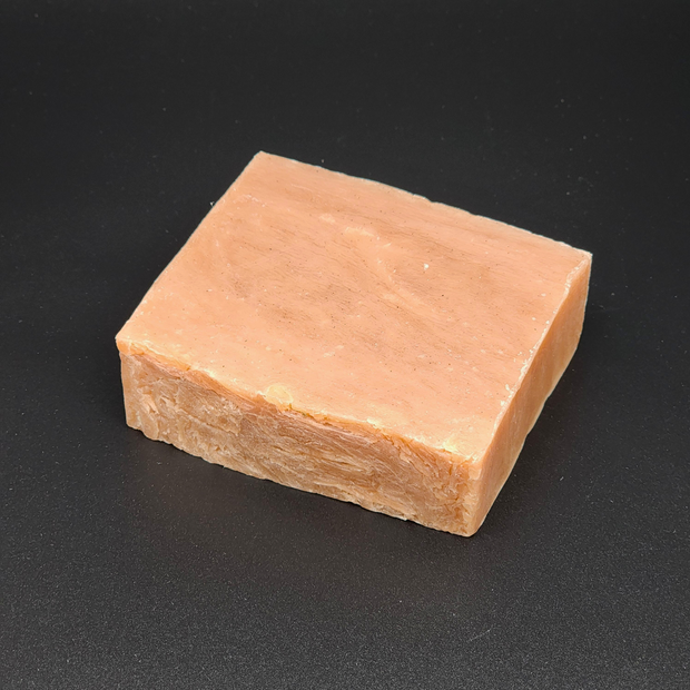 Square bar of soap on a black background