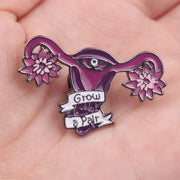 Pin de solapa esmaltado feminista "Grow a Pair"