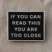 "If You Can Read This You Are Too Close" Enamel Lapel Pin