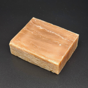 Block of soap on a black background