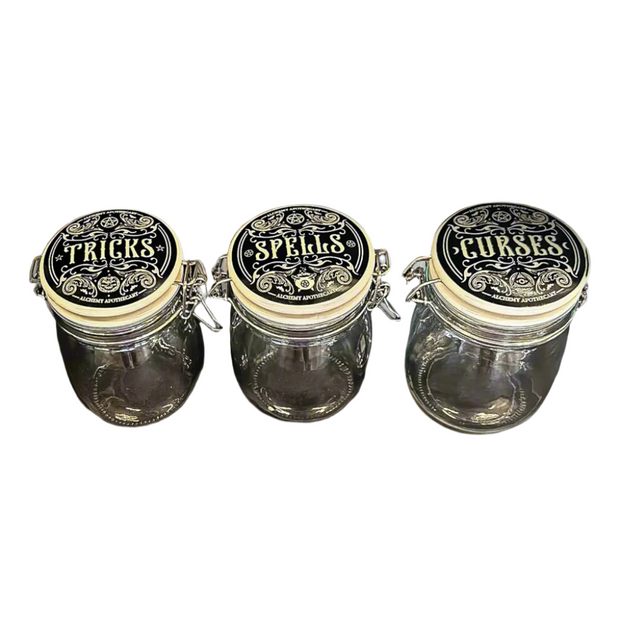 Kitchen Witch Apothecary Jar Canisters by Alchemy Gothic - Labeled Tricks, Spells, and Curses -Perfect for Storing Coffee, Tea, Sugar, Herbs, Crystals, or Other Magical Ingredients - Apothecary Aesthetic - Gift for Kitchen Witch - Ideal for Altar and Halloween Gothic Decor - Glass Jar Canisters with Stainless Steel Lids