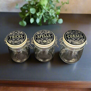 Kitchen Witch Apothecary Jar Canisters by Alchemy Gothic - Labeled Tricks, Spells, and Curses - Perfect for Storing Coffee, Tea, Sugar, Herbs, Crystals, or Other Magical Ingredients - Apothecary Aesthetic - Gift for Kitchen Witch - Ideal for Altar and Halloween Gothic Decor - Glass Jar Canisters with Stainless Steel Lids