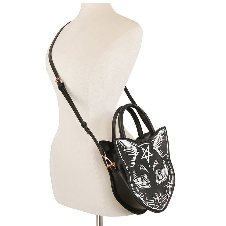 Black handbag with cat design on a mannequin against a white background