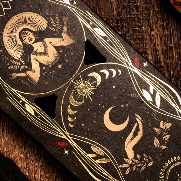Decorative packaging with celestial design on a wooden surface