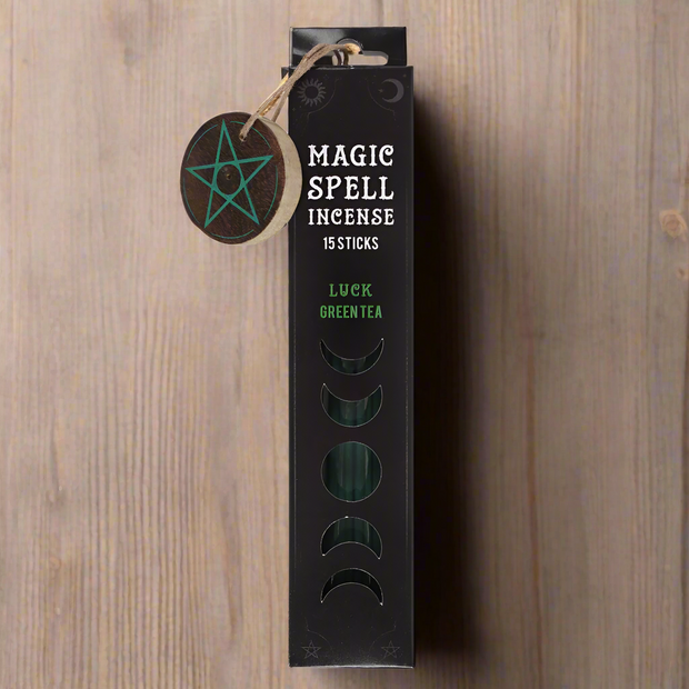 Magic Spell incense packaging with pentagram burner on a white background