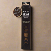 Box of Magic Spell Incense with a pentagram tag on a beige background