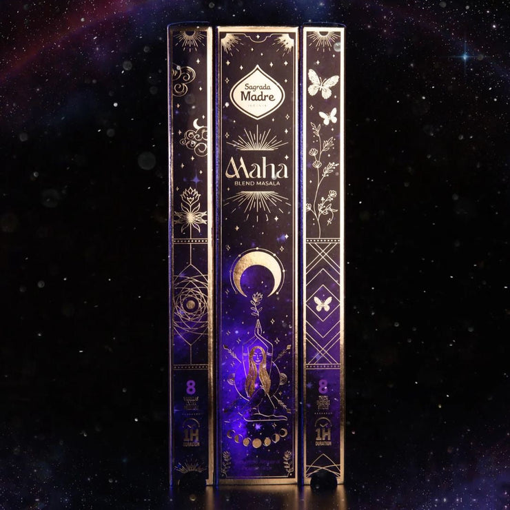 Decorative incense packaging with 'Maha' branding against a starry night sky background
