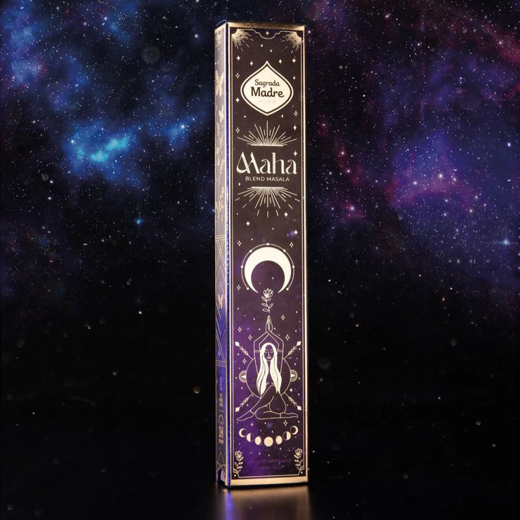 Maha incense stick packaging with celestial design against a starry background