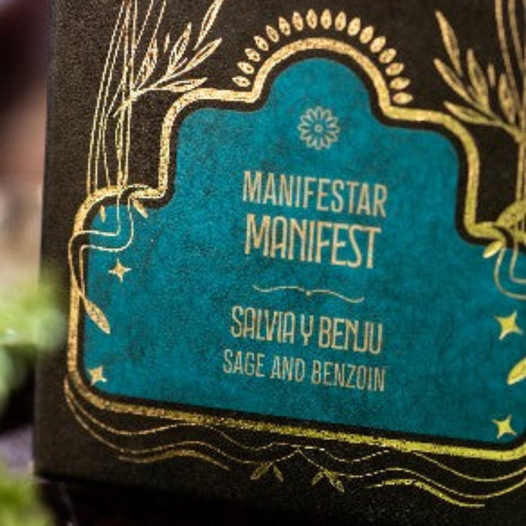 Product packaging with 'Manifest' branding and decorative elements.
