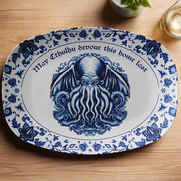 Decorative plate with blue Cthulhu design and text on a wooden surface