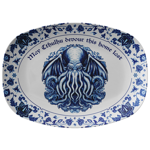 Decorative plate with blue Cthulhu design and text on a white background