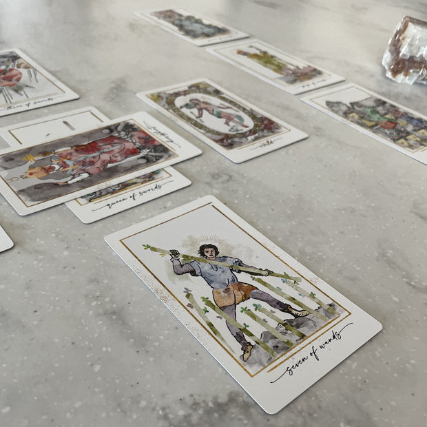 Tarot cards laid out on a textured surface