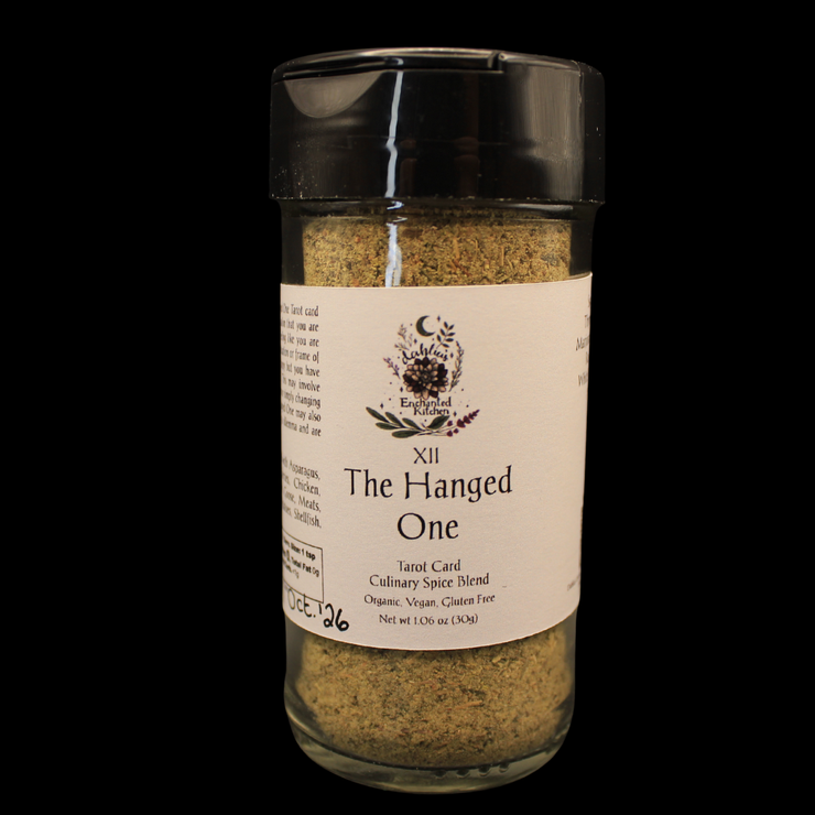 Spice blend in a glass jar with a label on a black background