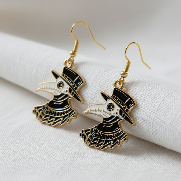 Plague Doctor Gold Enamel Earrings on a white background