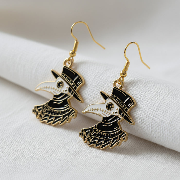 Plague Doctor Gold Enamel Earrings on a white background
