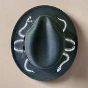 Black hat with white snake skeleton designs on a white background