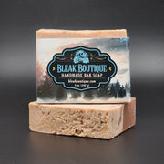 Bleak Boutiques Sweet Tooth Handmade Vegan Bar Soap (SEASONAL) is shown: two marbled bars, one upright with a Sugar • Spice • Sprinkles label, offering delightful scents and handcrafted appeal.