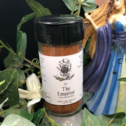 Spice jar labeled 'The Emperor' on a decorative background with a fairy figurine and greenery.