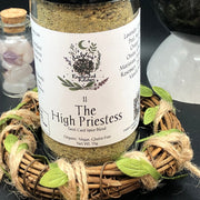 Spice blend jar labeled 'The High Priestess' on a decorative background with crystals and herbs.