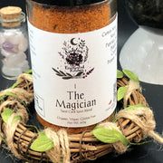 Spice blend jar labeled 'The Magician' with decorative elements on a dark background
