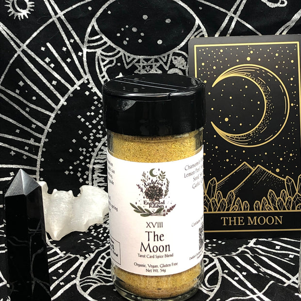 Tarot Card Spice Blend "The Moon" by Dahlia's Enchanted Kitchen surrounded by tarot themed items