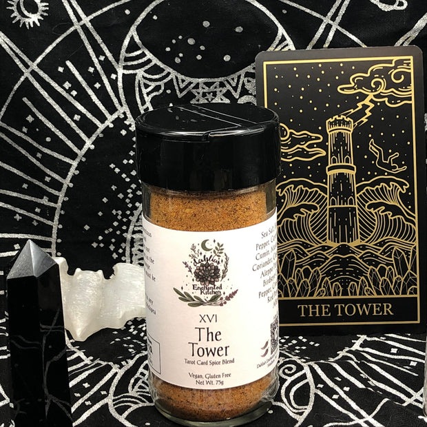Tarot Card Spice Blend "The Tower" by Dahlia's Enchanted Kitchen surrounded by tarot themed items.