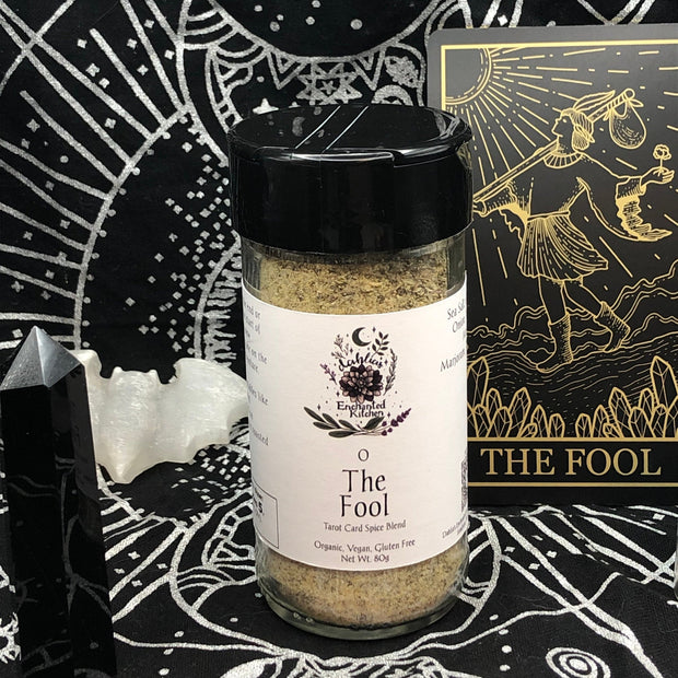 Spice blend jar labeled 'The Fool' on a mystical-themed background with astrological symbols.