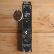 Pack of 15 incense sticks labeled 'Black Opium' by 'The Moon' on a white background.