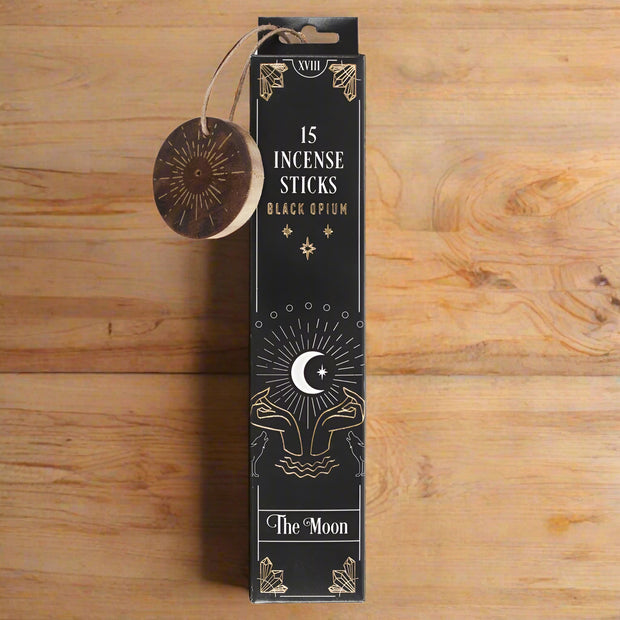 Pack of 15 incense sticks labeled 'Black Opium' by 'The Moon' on a white background.