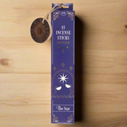 Box of 15 lavender incense sticks with decorative design on a wooden surface