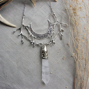 Collier de branches de croissant de lune en cristal blanc