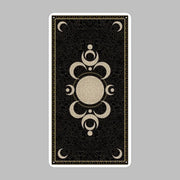 Deviant Moon Tarot Deck by Patrick Valenza showcasing unique gothic-themed tarot cards with moon-faced characters inspired by childhood dreams.  